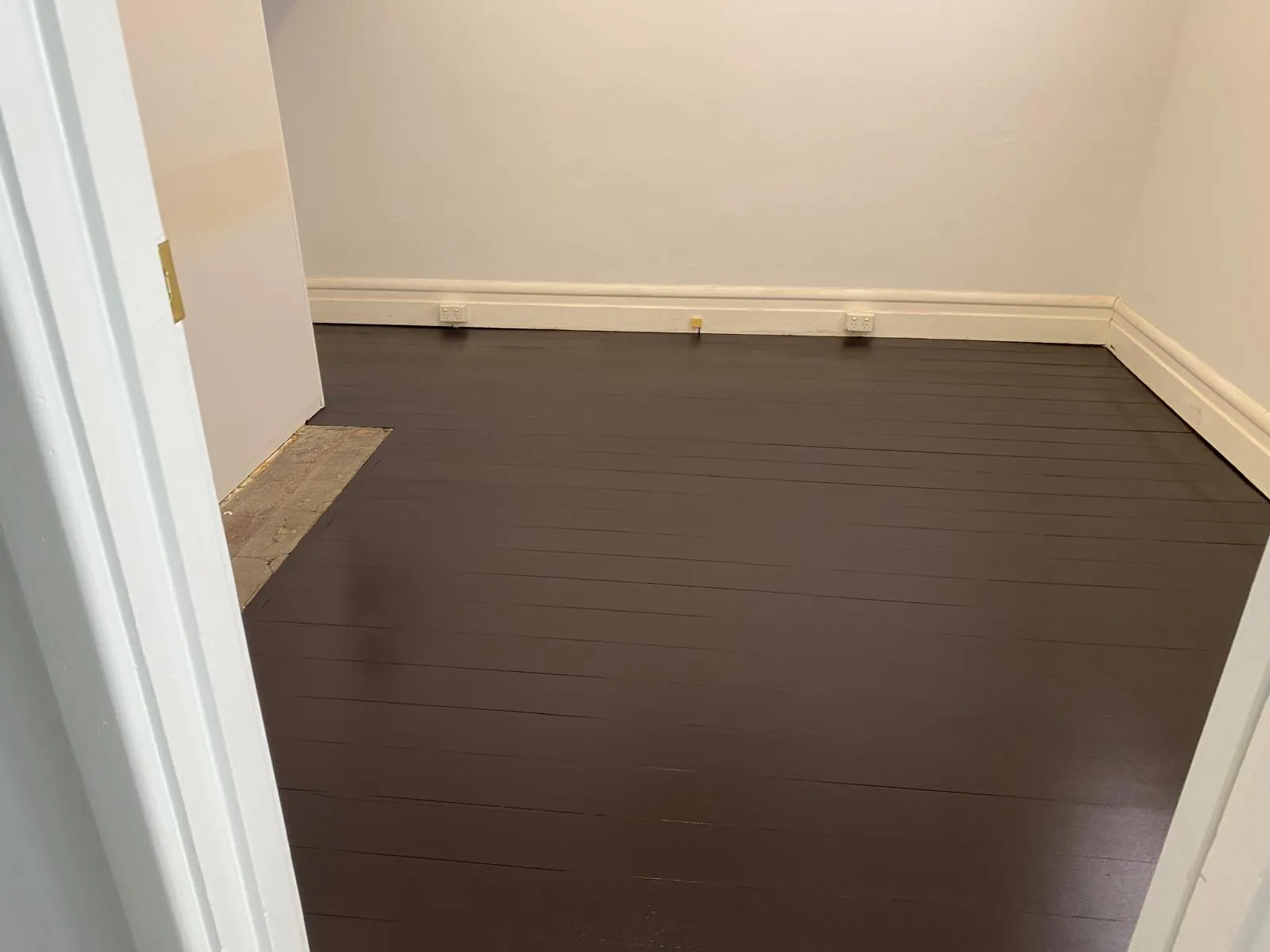 Completed dark epoxy floor coating