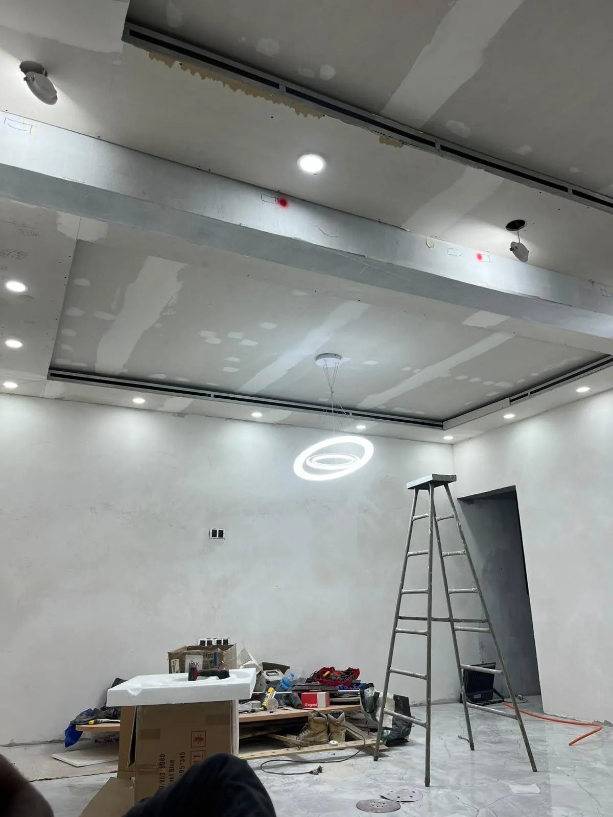 Finished false ceiling with recessed lights