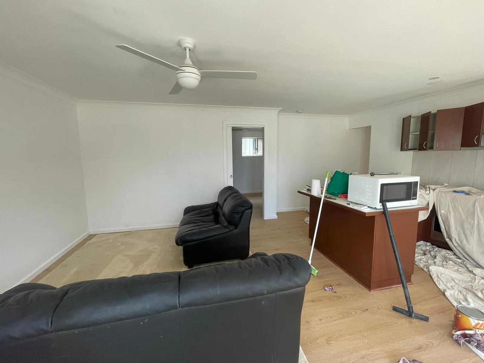 Finished open-plan living and kitchen area